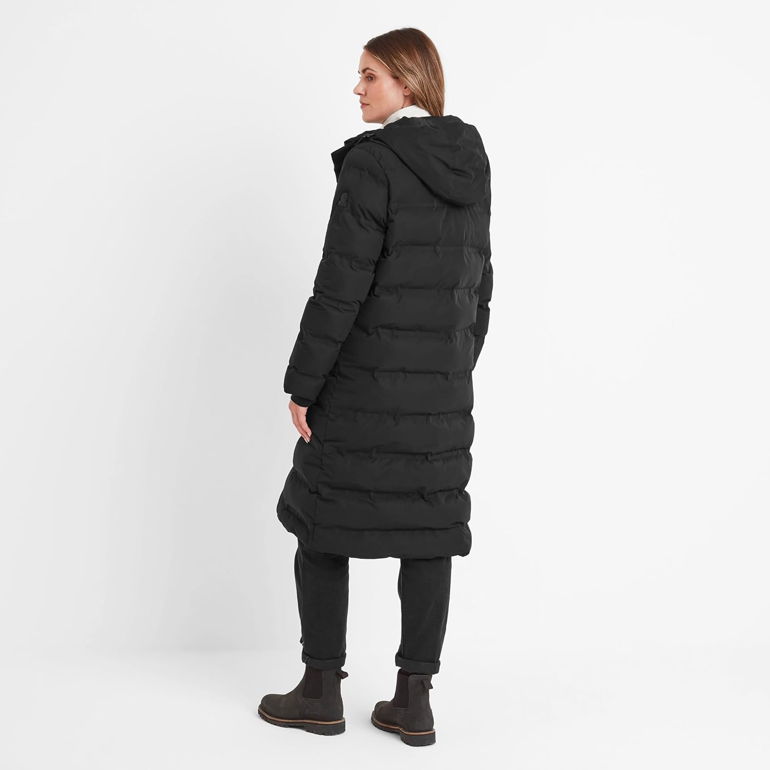A long women’s insulated puffer coat with water-repellent (DWR) finish, heat-sealed baffled insulation and adjustable toggles at the hood and waist for a warm, weather-ready and flattering fit.